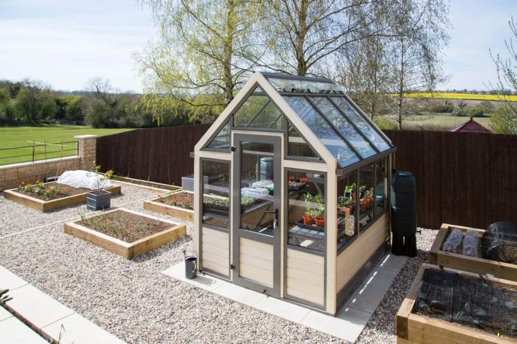 Small Accoya Greenhouse amongst raised beds.